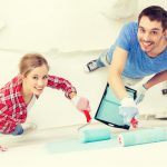 couple painting interior 10 tips to sell your home